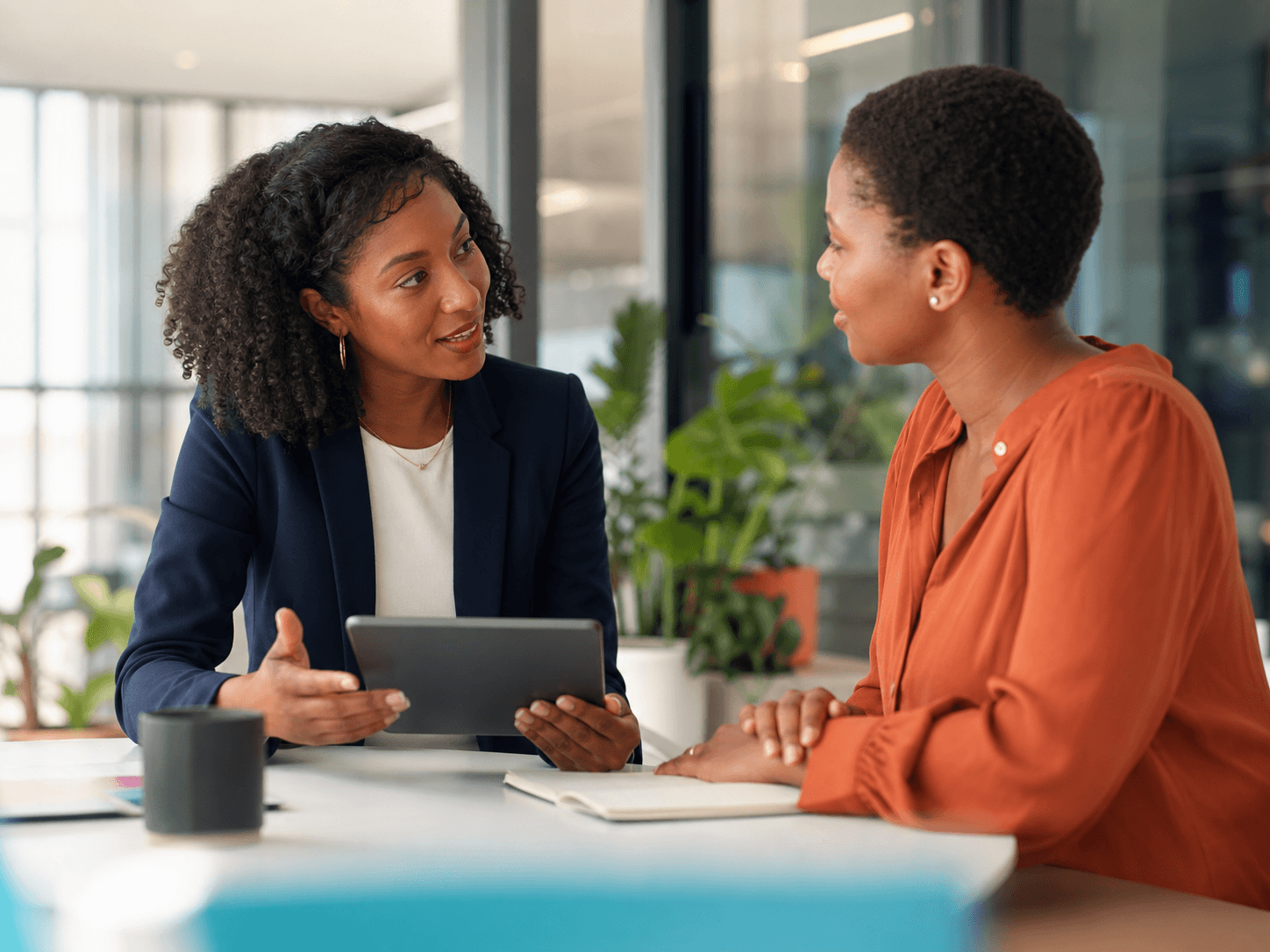 A KIR technology consultant listening to a business owner